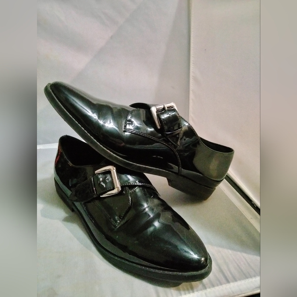 Women's black patent pointy silver tone buckle slip-on shoes Aldo size 10